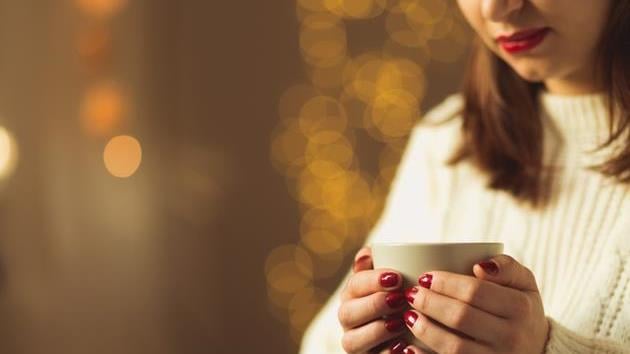 635851072823632064WomanChristmasCoffee  1 .jpg